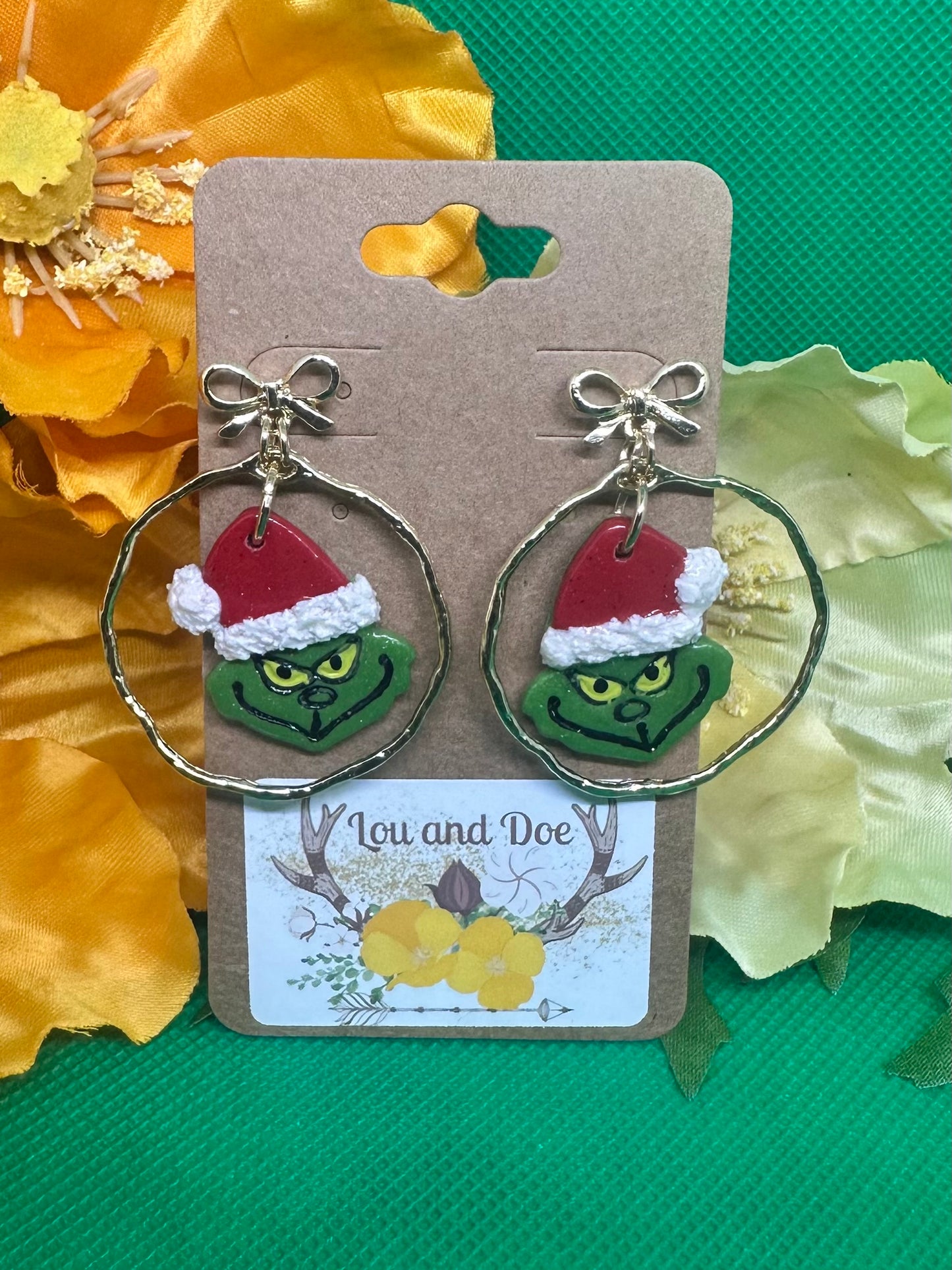 💚grinchy dangle earrings inside gold embellishment on gold bow findings💚