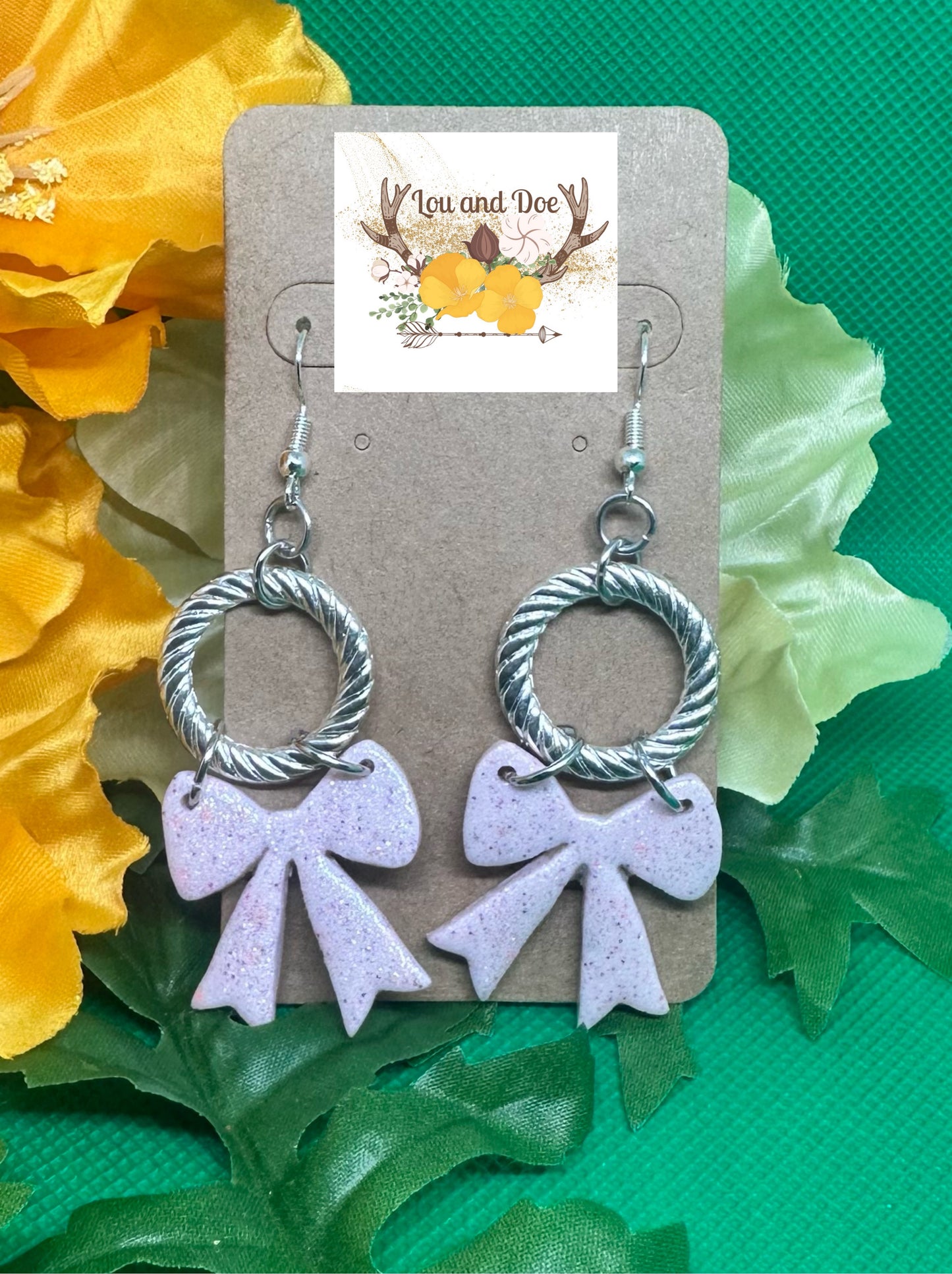 🎀Glitter pink bow dangle earrings with a silver wreath charm on silver shepherds hooks🎀