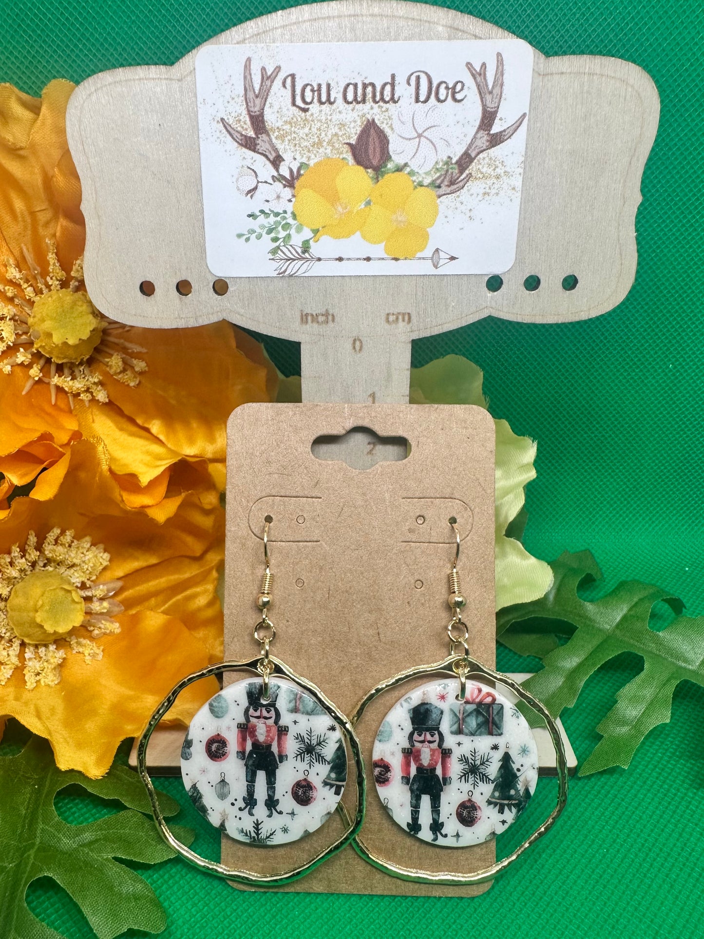 🥜Nutcracker holiday dangle earrings inside a gold embellishment on gold shepherds hooks🥜