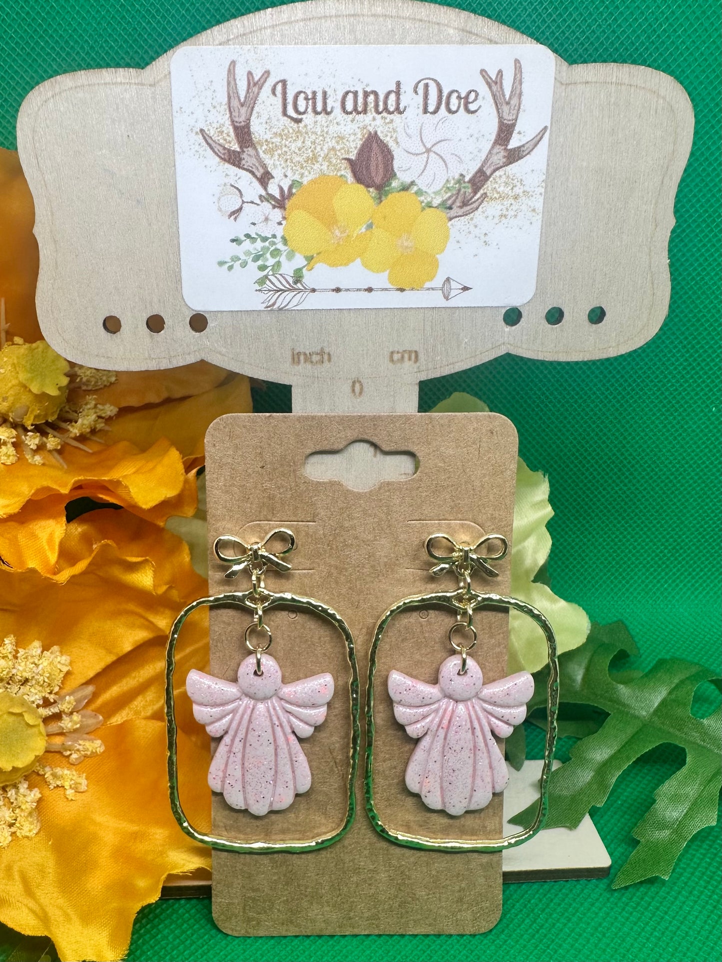 🎀pink angel dangle earrings inside a gold embellishment on gold bow findings🎀